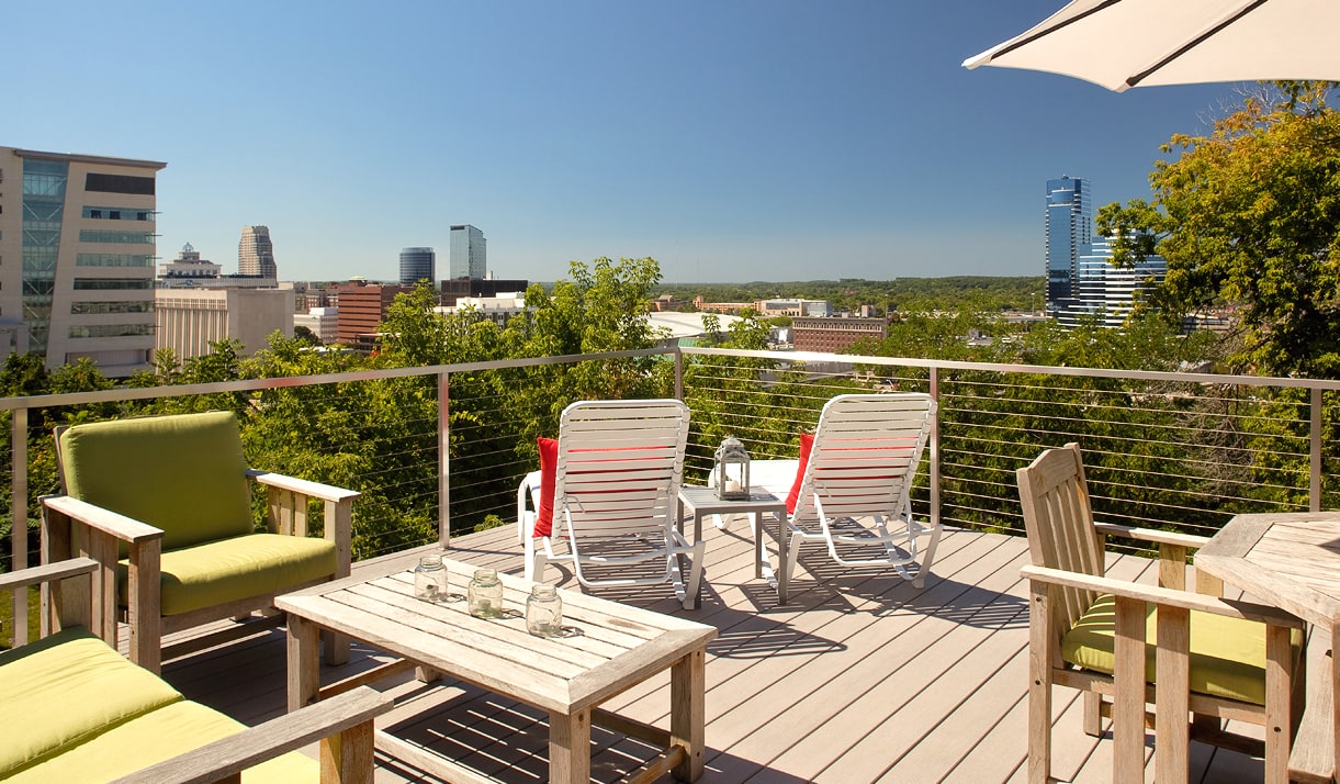 A rooftop deck overlooking grand rapids.